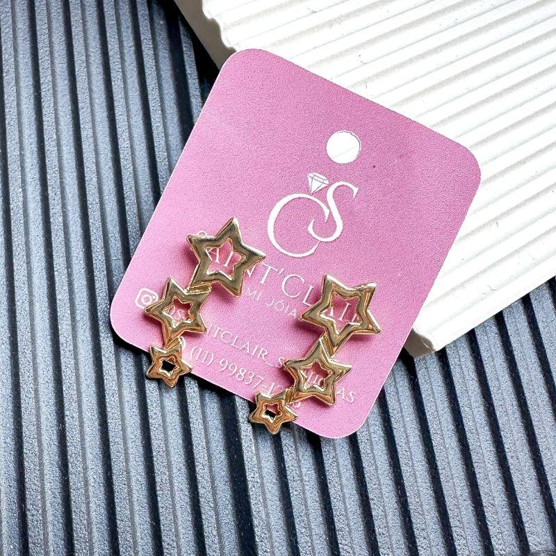 brinco tres estrelas