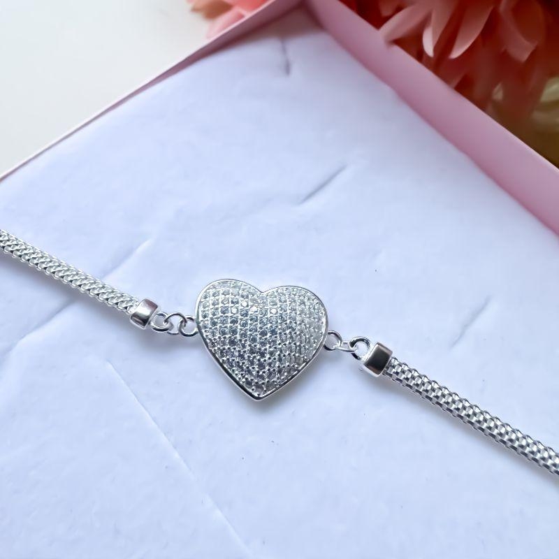 pulseira malha 16.5cm e ext 3cm com coração cravejado