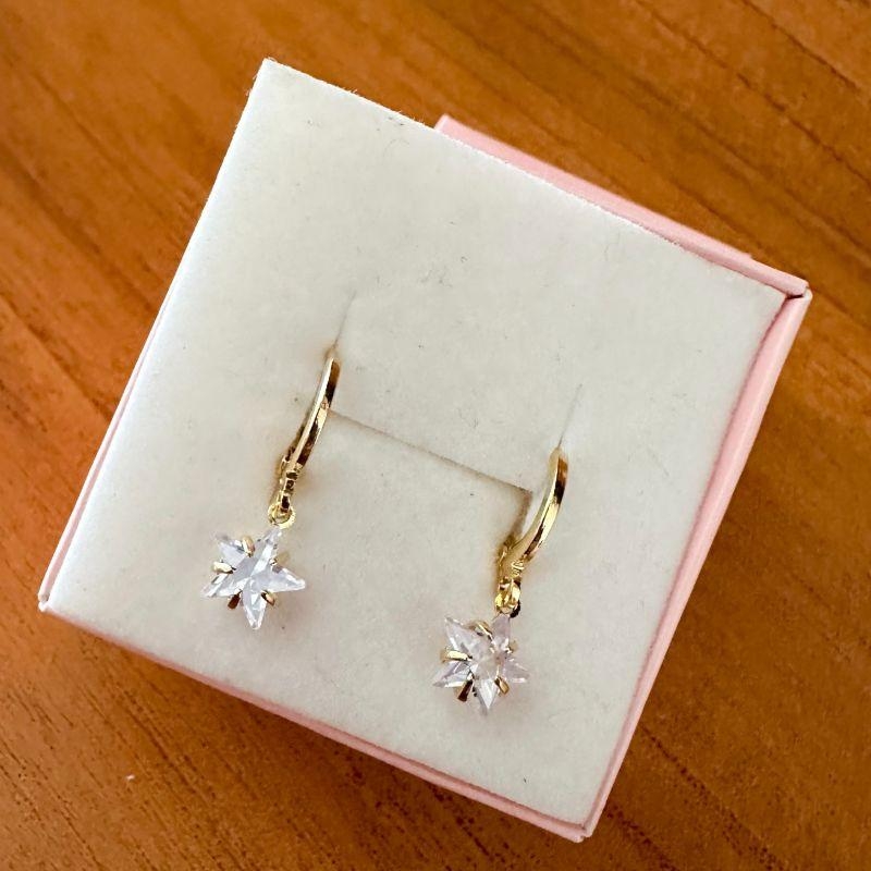 brinco tranqueta com estrela cristal