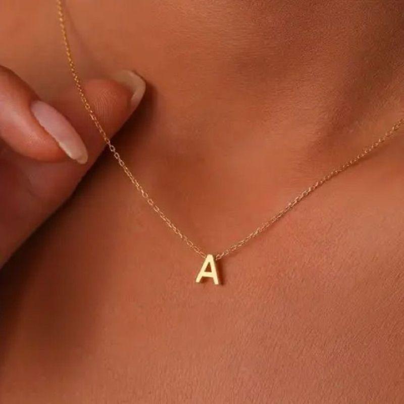 COLAR INICIAL LISA (corrente 40cm, extensor 6.5cm e pingente 0.9mm)